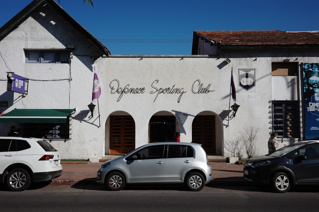 elgin-sporting-club-building-with-cars-parked-outside-qg-gaxunfp8